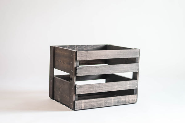 Dark stained wooden LP record holder crate on white background