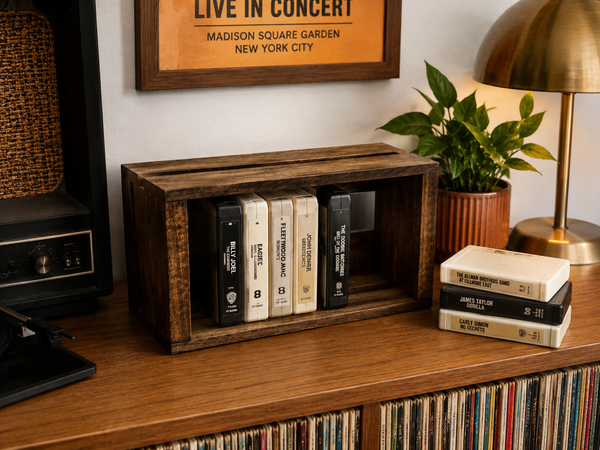 Early American wooden 8 track tape storage crate displayed on a record cabinet with vintage 8 track tapes