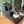 Handmade rustic 3-step wooden stairs used as a display stand for decor and plants.