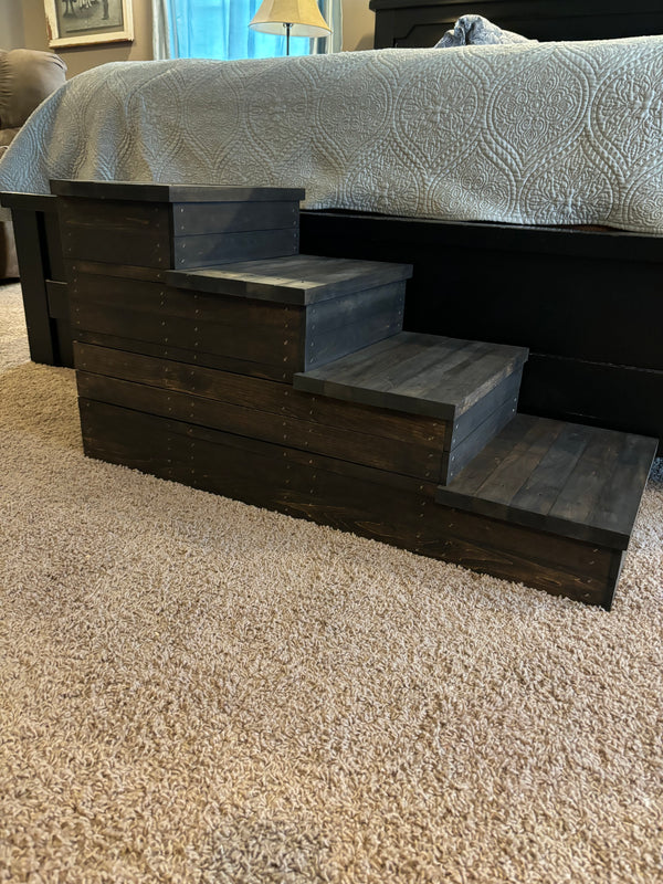 Rustic 4-step pet stairs beside a bed in a farmhouse style bedroom