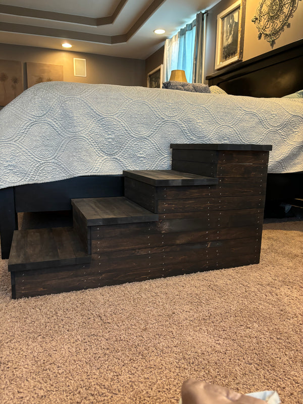 Rustic 4-step pet stairs in dark walnut stain against bedroom furniture