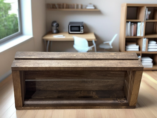 Empty rustic wooden cassette tape holder in a modern office space.