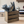 Rustic utensil holder wooden crate full of utensils on countertop