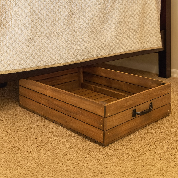 Rustic rolling wooden under-bed storage drawer under bed on beige carpet