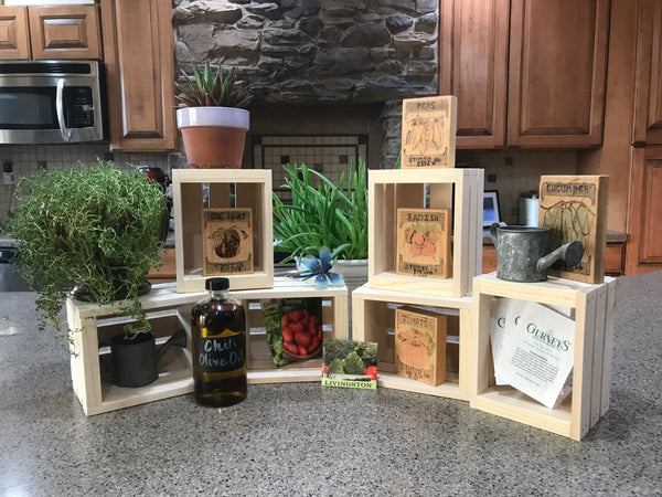 Set of 6 small natural wooden crates styled with herbs, plants, and rustic kitchen decor.
