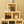 Farmhouse-style living room display with six stacked natural wood crates styled with books, candles, and decor.