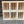 Six small natural wood crates stacked vertically, perfect for shelves or display.