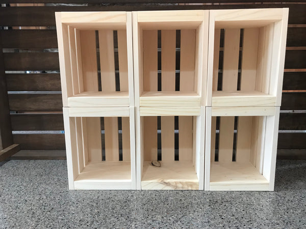 Six small natural wood crates stacked vertically, perfect for shelves or display.