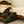 Cat climbing rustic wooden 3-step pet stairs to reach the bed.