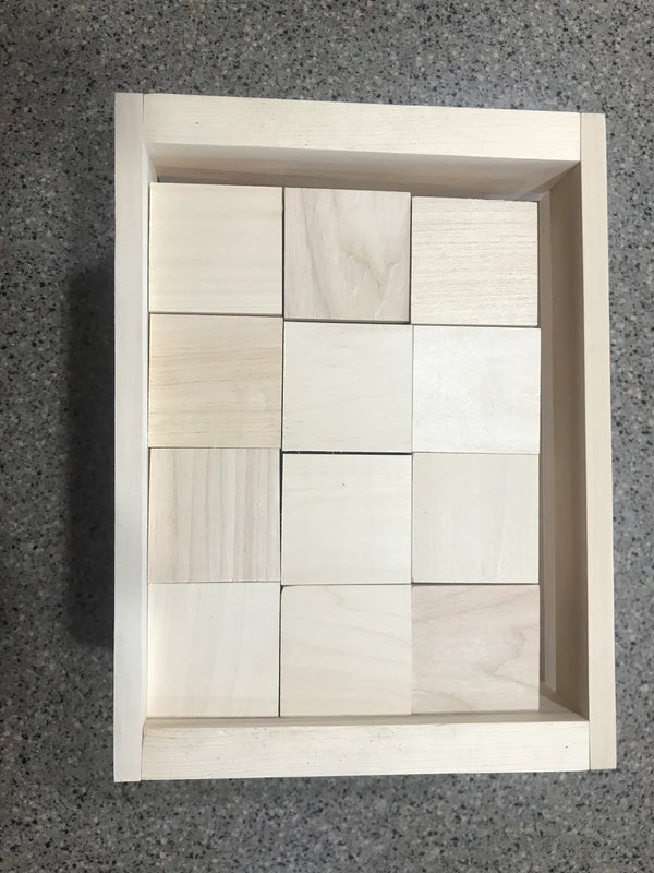 Natural wooden blocks neatly stored inside a wooden crate