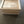 Top view of 60 natural wooden blocks arranged in crate