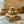 Rustic farmhouse cupcake stand in antique gray finish holding cupcakes for a birthday celebration.