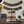 Rustic antique gray 3-tier wooden cupcake stand with cupcakes at a retirement party celebration.
