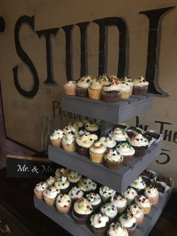 Rustic farmhouse-style antique gray cupcake stand with multiple tiers.