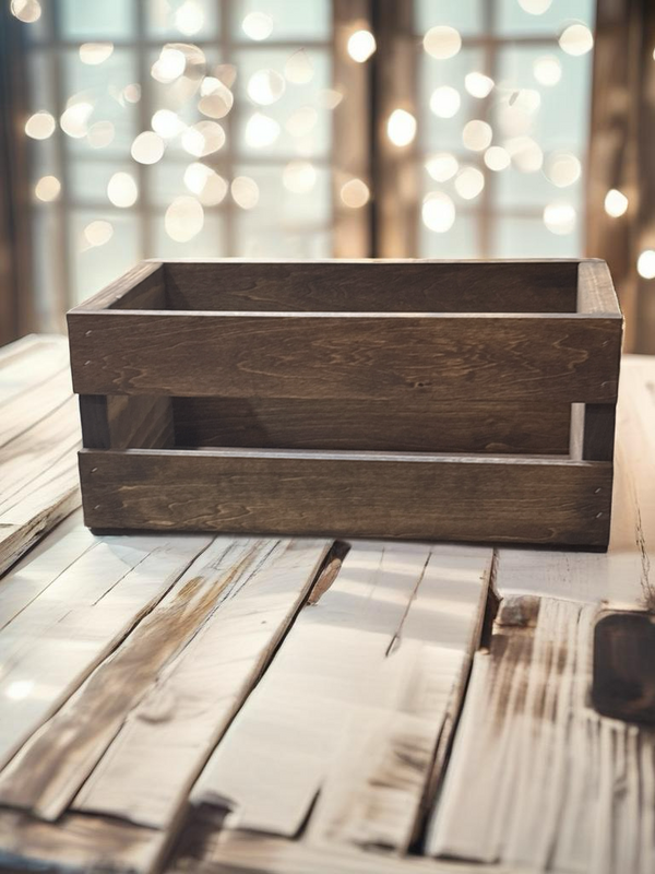 Rustic wooden CD storage crate on distressed wood table with glowing lights.