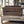 Wooden CD holder crate labeled “CD Holder Wood Crate” sitting on rustic coffee table.