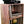Handmade cherry wood 2-tier record player stand with vinyl record storage.