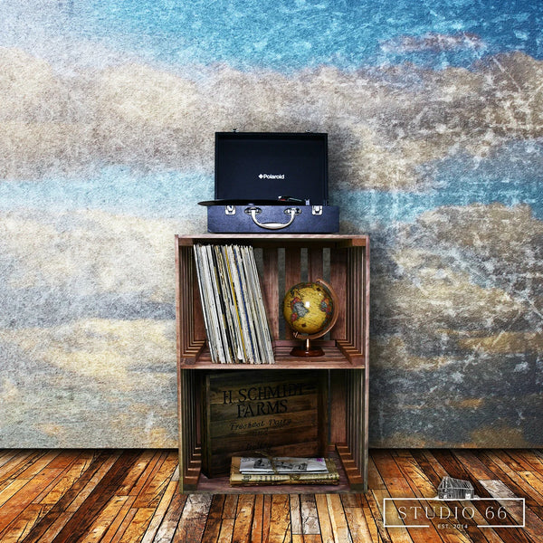 Handcrafted cherry stained turntable stand with records, globe, and books for storage.