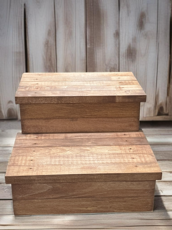 Front view of cherry stained two-step wooden pet stairs on deck