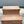 Cherry stained rustic two-step wooden pet stairs in sunlight