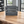 Farmhouse style dark wood LP holder crate on rustic wood table