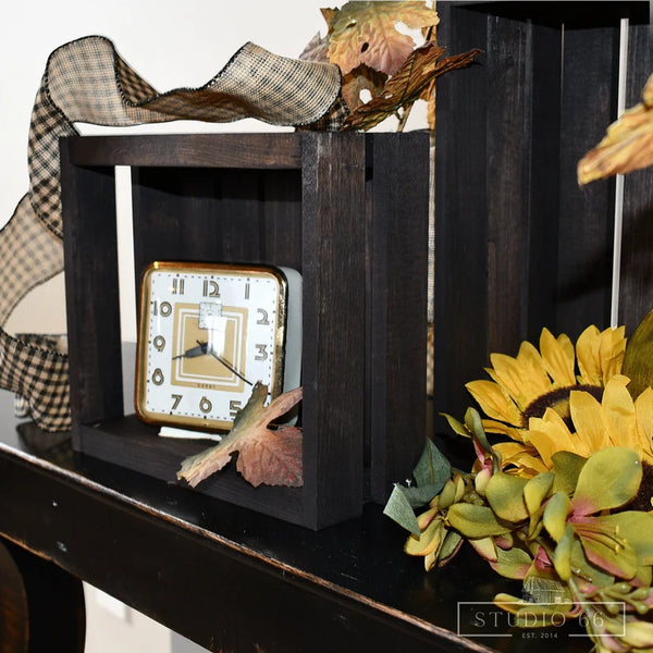 Dark stained wooden crates for rustic home decor and storage solutions.