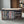 Wooden DVD storage crate on display with movie collection.