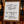 Wooden easel sign with whiteboard surface displaying cocktail specials