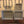 Set of 4 empty gray rustic nesting crates in different sizes on a dresser
