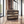 Medium brown vinyl record holder crate styled in farmhouse living room