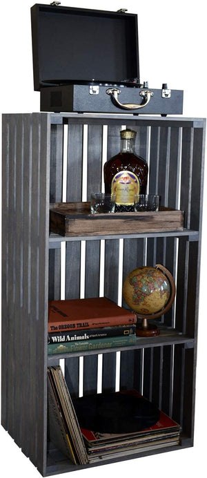 Close-up of rustic gray 3-tier turntable stand with record player, globe, and vintage books.