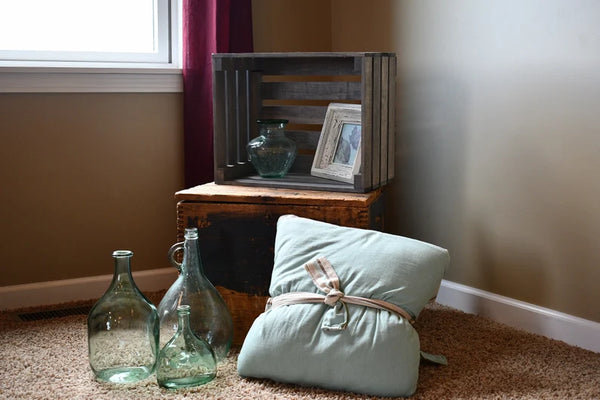 Rustic gray stained slat end wooden crate for versatile storage