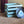 Vintage Blue record crate with vinyl albums and loose record