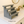 Rustic wooden makeup stand in antique gray finish, 3-tier organizer for cosmetics and bathroom counter storage.
