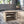 Front view of medium 45 RPM vinyl record storage crate, rustic wood design