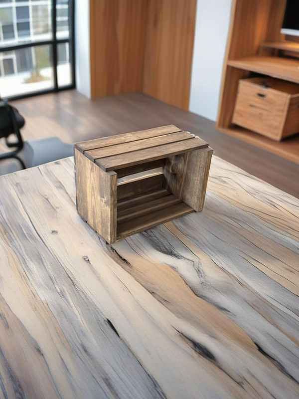 Rustic medium 45 RPM record crate on office table, wooden vinyl organizer