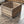 Rustic wooden crate with slat ends, medium brown stained farmhouse storage