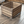 Wooden slat end crate in medium brown finish for rustic storage and decor