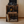 Medium brown rustic turntable stand with record storage shelves.