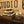 Medium wood cupcake stand with cupcakes in front of Studio 66 rustic wall