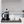 Rustic gray wood serving tray with French press and creamers in kitchen