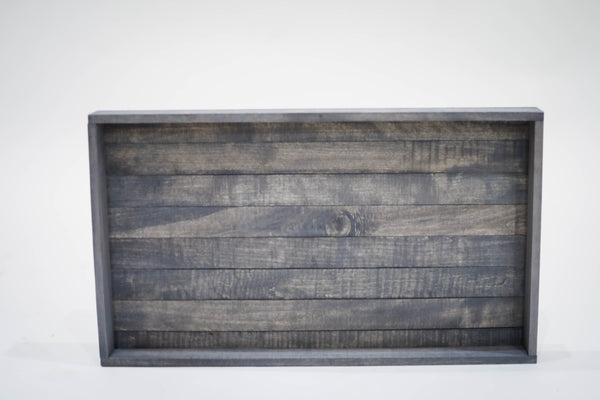 Top view of rustic medium gray wooden serving tray