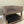 Handmade wooden pet bed with top and bottom bunks in medium brown finish