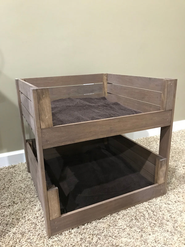 Handmade wooden pet bed with top and bottom bunks in medium brown finish