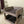 Two-tier wooden pet bed with cozy bedding in medium brown
