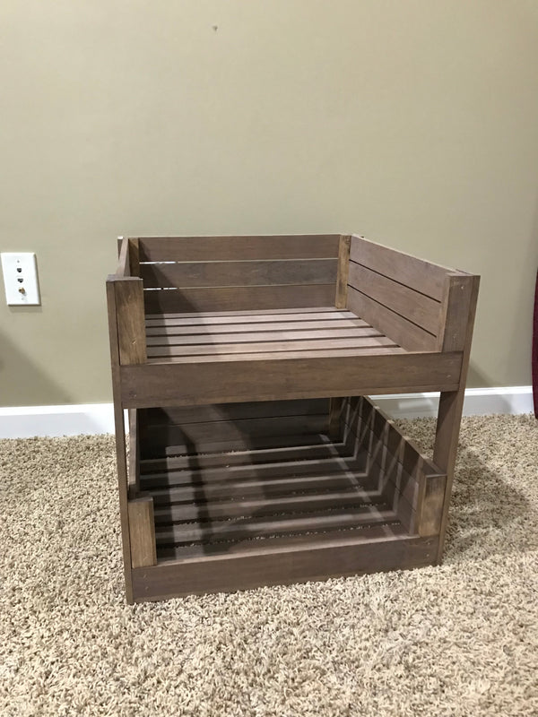 Tabletop view of farmhouse pet bunk bed in medium brown stain