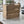 Video showcasing rustic wooden utensil holder crate in a kitchen setting