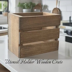 Video showcasing rustic wooden utensil holder crate in a kitchen setting