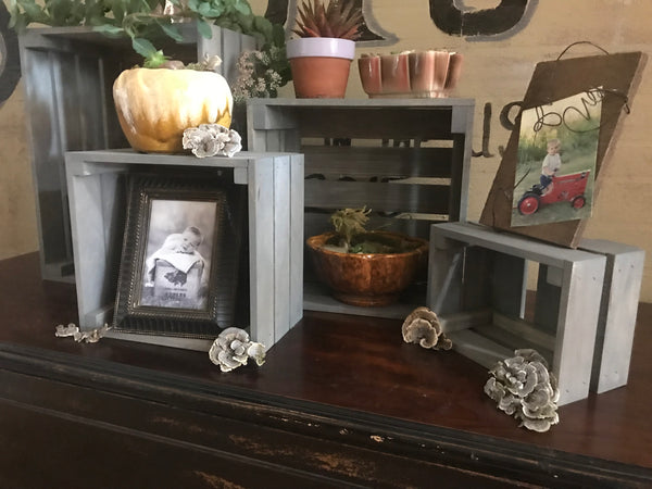 Set of 4 rustic gray nesting crates styled with greenery and farmhouse décor