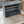 Small dark wood crate product photo on white background, rustic organizer box.